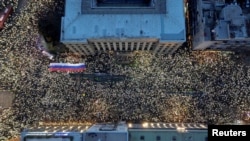 Students protest against government policies, corruption, and negligence, which they blame for the deaths of the victims in the November 2024 Novi Sad railway station disaster, outside the constitutional court in Belgrade, Serbia, Jan. 12, 2025.