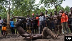 FILE—Members of Uganda's Soft Ground Wrestling battle during a training session at their camp in Mukono on February 28, 2024.