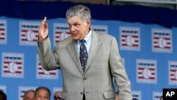 FILE - In this July 26, 2015, photo, National Baseball Hall of Famer Tom Seaver arrives for an induction ceremony at the Clark Sports Center in Cooperstown, N.Y. 