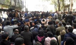 Protesters attend a demonstration after authorities raised gasoline prices, in the northern city of Sari, Iran, Nov. 16, 2019.