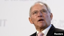 German Finance Minister Wolfgang Schaeuble delivers his speech during the 'German Economic Forum,' organized by German weekly newspaper 'Die Zeit,' in the St.Michaelis church in Hamburg, Germany, November 8, 2012.