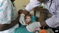 Essaie d'un vaccin contre le paludisme à Kilifi, au Kenya