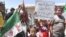 Young demonstrators protest against Syria's President Bashar al-Assad in Al Kasten, near Idlib,June 29, 2012.