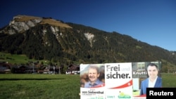 Election posters of the Swiss People's Party (SVP) candidates are pictured, days ahead of federal elections, in Lenk, Switzerland, Oct. 14, 2019.