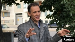 Author David Lagercrantz speaks to the media in Stockholm, Sweden, Sept. 7, 2017. 