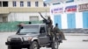 Soldiers patrol outside the Hayat Hotel in Mogadishu, Somalia, Aug, 20, 2022. At least 10 people were killed in an attack by Islamic militants who stormed the hotel late Friday, police and eyewitnesses said. 