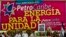 FILE - Under a portrait of the late Hugo Chavez, Venezuela's President Nicolas Maduro, fourth from right, and Nicaragua's President Daniel Ortega, third from right, preside over 8th Petrocaribe Summit in Managua, Nicaragua, June 29, 2013. 