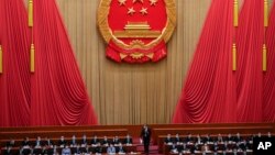 资料照片：中国全国人大去年在北京人民大会堂开会。（2023年3月13日）