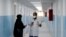 Members of the medical staff work at a new section specialized in receiving any person who may have been infected with coronavirus, at the Al-Bashir Governmental Hospital in Amman, Jan. 28, 2020.