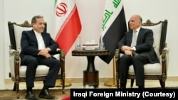 Menteri Luar Negeri Irak Fuad Hussein menerima Menlu Iran Abbas Araghchi di Baghdad hari Minggu (13/10) 