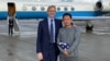 FILE - In this image released by the US State Department US Special Representative for Iran Brian Hook welcomes Princeton graduate student Xiyue Wang on arrival in Switzerland after his release from Iran on Dec. 7, 2019. (Ho/US State Department/AFP)