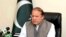 An handout picture released by the Pakistan Press Information Department (PID), March 28, 2016, shows Pakistan's Prime Minister Nawaz Sharif addressing the nation at his office in Islamabad.