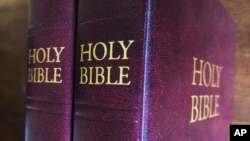 FILE - Bibles are displayed in Miami, July 5, 2019. Religious publishers say President Donald Trump's most recently proposed tariffs on Chinese imports could result in a Bible shortage. 
