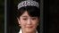 FILE - Japan's Princess Mako, the first daughter of Prince Akishino and Princess Kiko, poses for photos at Imperial Palace in Tokyo. Mako, the granddaughter of Emperor Akihito, is getting married to an ocean lover who can ski, play the violin and cook, according to public broadcaster NHK TV. The Imperial Household Agency declined to confirm the report Tuesday, May 16, 2017.