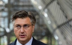 Croatia's Prime Minister Andrej Plenkovic arrives on the second day of a EU summit, in Brussels, on October 16, 2020.