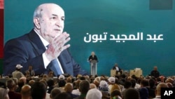 FILE - Algerian president and candidate for reelection Abdelmajid Tebboune delivers a campaign speech in Oran, Algeria, Aug. 26, 2024.