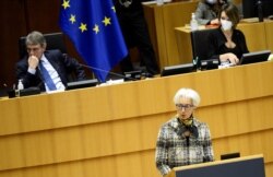 FILE - European Central Bank (ECB) President Christine Lagarde addresses the European Parliament in Brussels, Belgium, Feb. 8, 2021.