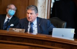 FILE - Senator Joe Manchin, a Democrat from West Virginia and chairman of the Senate Energy and Natural Resources Committee, speaks at a hearing in Washington, Feb, 24, 2021.