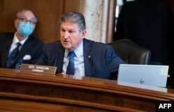 FILE - Senator Joe Manchin, a Democrat from West Virginia and chairman of the Senate Energy and Natural Resources Committee, speaks at a hearing in Washington, Feb, 24, 2021.