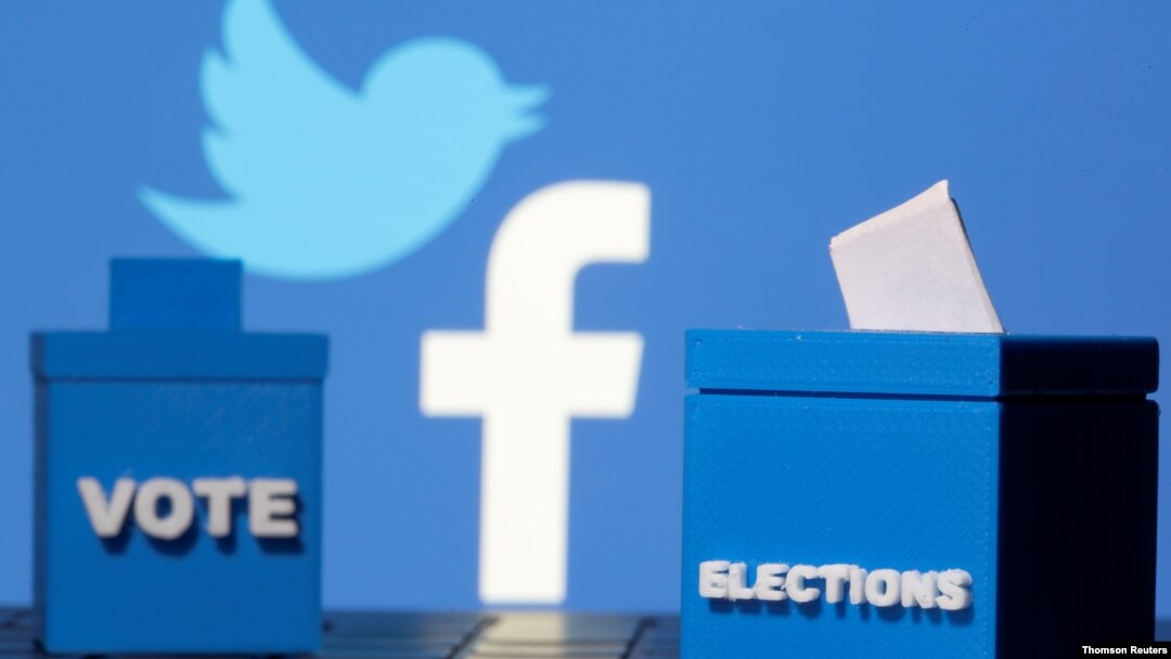 Gambar 3 Dimensi kotak suara di depan logo Facebook dan Twitter. (Foto: Reuters) 