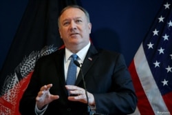 FILE - U.S. Secretary of State Mike Pompeo speaks during a news conference at the U.S. Embassy in Kabul, Afghanistan, June 25, 2019.