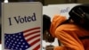 A person votes in the 2024 U.S. presidential election on Election Day, at Pittsburgh Manchester School in Pittsburgh, Pennsylvania, Nov. 5, 2024. 