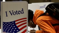 A person votes in the 2024 U.S. presidential election on Election Day, at Pittsburgh Manchester School in Pittsburgh, Pennsylvania, Nov. 5, 2024. 