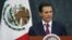 FILE - Mexico's President Enrique Pena Nieto talks during an official swearing-in ceremony for new ministers at the Los Pinos official residence in Mexico City, Aug. 27, 2015.