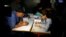 Officials count ballots after polls have been closed at a polling station in Rabat, Morocco, Oct. 7, 2016.