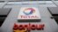 The logo of French oil and gas company Total is seen at a petrol station in Paris, France, February 8, 2021. REUTERS/Sarah Meyssonnier