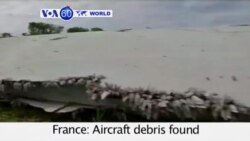 VOA60 World- Possible debris from missing MH370 found on island of Reunion- July 30, 2015