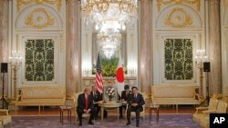 U.S. President Donald Trump, left, meets with Japanese Prime Minister Shinzo Abe at Akasaka Palace, Japanese state guest house in Tokyo, Monday, May 27, 2019.