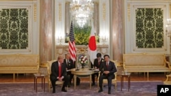 U.S. President Donald Trump, left, meets with Japanese Prime Minister Shinzo Abe at Akasaka Palace, Japanese state guest house in Tokyo, Monday, May 27, 2019.