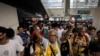 Hong Kong’s Grandpa Protesters Speak Softly, Carry a Stick