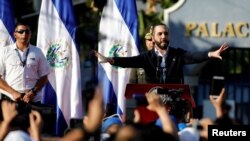 Salvadoran President Nayib Bukele gestures as he addresses his supporters protesting outside the national congress to push for the approval of funds for a government security plan in San Salvador, El Salvador February 9, 2020.