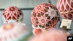 FILE - The temari balls are displayed at Sanuki Kagari Temari in Kawaramachi, Kagawa prefecture, Japan, on Sept. 5, 2024. (AP Photo/Ayaka McGill)