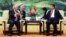 U.S. Secretary of State Rex Tillerson, left, meets with China's President Xi Jinping at the Great Hall of the People, Saturday, Sept. 30, 2017, in Beijing.