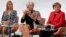 Ivanka Tramp, ćerka i savetnica predsednika SAD Donalda Trampa, predsednica Međunarodnog monetarnog fonda Kristin Lagard i nemačka kancelarka Angela Merkel (s leva na desno), tokom panela W20 u Berlinu, Nemačka, 25. aprila 2017. (AP Photo/Markus Schreiber)