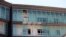A rocket-propelled grenade damaged Libyan government offices in Tripoli June 4, 2014.