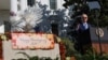 (FILE) U.S. President Joe Biden pardons the National Thanksgiving Turkey on the South Lawn at the White House in Washington, U.S., November 25, 2024.