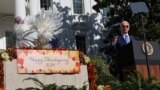 (FILE) U.S. President Joe Biden pardons the National Thanksgiving Turkey on the South Lawn at the White House in Washington, U.S., November 25, 2024.