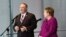 U.S. Secretary of State Mike Pompeo (L) and German Chancellor Angela Merkel hold a joint news conference in Berlin, Germany, Nov. 8, 2019.