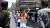 Authorities provide essential food to residents living in Psar Kandal I commune during the country's lockdown in Phnom Penh and Takhmau city, Cambodia, on April 26, 2021. (Kann Vicheika/VOA Khmer)