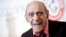 FILE - Actor Abe Vigoda smiles as he attends the Friars Club Roast of Betty White in New York, May 16, 2012. 
