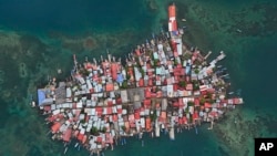 Buildings cover Gardi Sugdub island, part of the San Blas archipelago off Panama's Caribbean coast, May 25, 2024. Most of the people who live on Gardi Sugdub are preparing to evacuate the island because of rising sea levels.