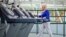 FILE - A woman with diabetes walks on a treadmill as part of an exercise program to help control the disease. Researchers who recently linked diabetes with cognitive and memory issues say keeping fit can help decrease the risk of vascular dementia in diabetics.