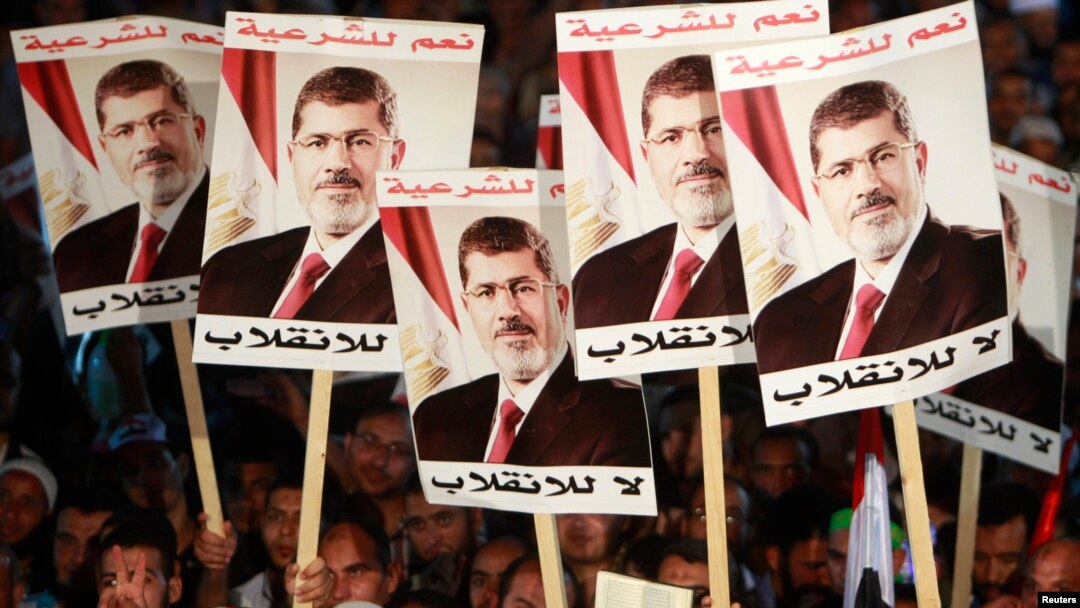 Supporters of deposed Egyptian President Mohamed Morsi protest at Rabaa al-Adawiya square in Cairo, Aug. 6, 2013. 