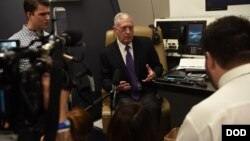 U.S. Secretary of Defense James N. Mattis speaks to reporters aboard a military aircraft en route to New Delhi, India, Sept. 4, 2018.