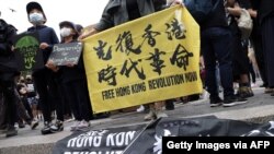 Hong Kongers gather during a rally at Union Square to support Hong Kong on June 12, 2021, in New York, NY. 