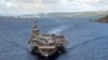PHILIPPINE SEA (June 4, 2020)In this June 4, 2020, photo provided by the U.S. Navy, the aircraft carrier USS Theodore Roosevelt (CVN 71) departs Apra Harbor in Guam. The carrier has returned to sea and is conducting military operations in the…